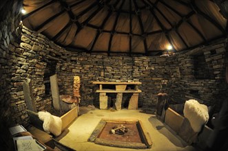 Replica of a house at the excavation site of the Neolithic settlement of Skara Brae