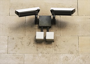 CCTV security cameras mounted on a wall