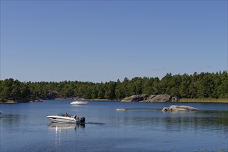 Motorboat in front of Finnhamn Island in the Stockholm Middle Archipelago