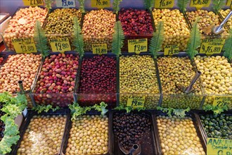 Different varieties of olives on sale at a market stall in Kadikoy