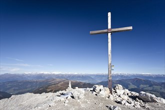 Summit cross on Peitlerkofel Mountain in Puez-Geisler Nature Park