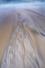Bizarre structures on the sandy beach