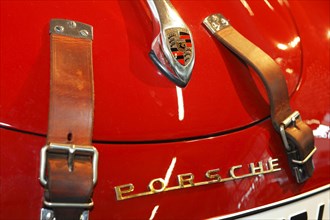 Porsche car with leather straps