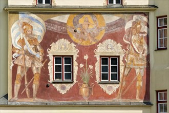 Medieval fresco with guardians in armour holding the Bavarian and Wasserburger standards below Jupiter on an eagle