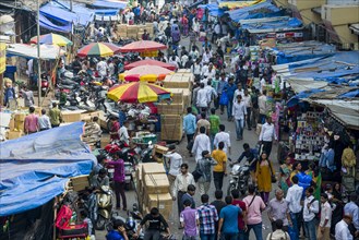 Crowded street with shops at Mangaldas Market