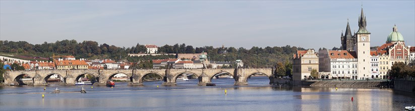 View over the Vltava River with the Bedrich Smetana Museum and Charles Bridge