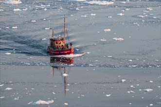 Boat in the Ilulissat Icefjord