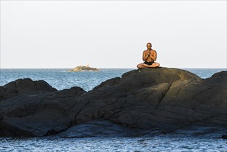 A man is meditating