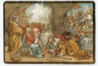 The three Magi kneeling before the Baby Jesus