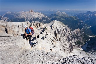 Climber on the Via Ferrata Marino Bianchi at Mt Monte Cristallo