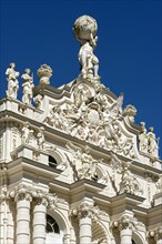 Facade of Schloss Linderhof Palace with figures of angels
