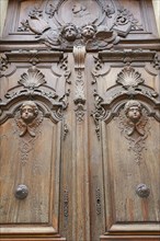 Wooden door with carvings