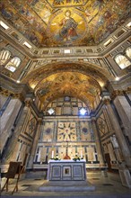 The interior of the Baptistry of Florence Cathedral with the altar and medieval ceiling mosaics