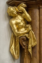 Atlas figure at the confessional