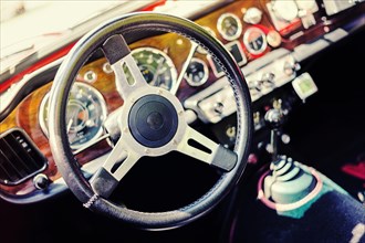 Dashboard and steering wheel of a vintage car