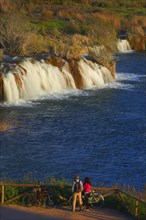 Tourists watching waterfalls