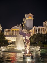Fountain and Roman statue in front of Hotel and Casino Caesars Palace