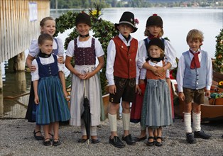 Children wearing traditional costumes