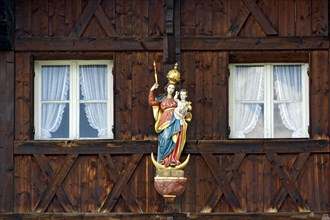 Madonna on an Upper Bavarian wooden house