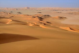 Claypan or playa and sand dunes of Oued In Djerane