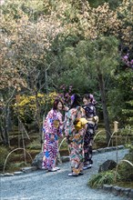 Japanese women with kimono in Sogenchi Garden