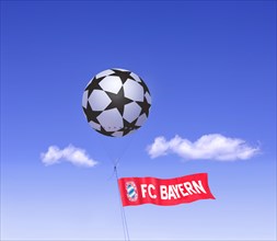 Moored balloon as Champions League football with the flag of FC Bayern Munich