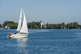Sailboat in front of Frauenchiemsee Island