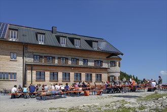 Hikers having a rest at Rotwandhaus