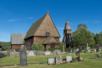 Old wooden church with a bell tower