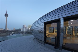 Futuristic pavilion with a mirrored facade