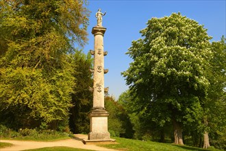 A neo-classical column in the English gardens designed by Capability Brown at Stowe House