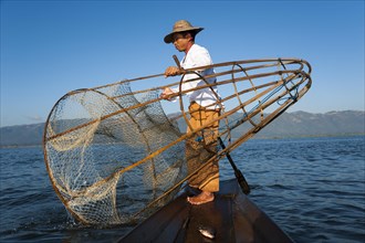 Fishermen with a traditional basket