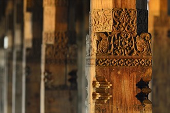 Carved wooden column at a Buddhist shrine of Sri Dalada Maligawa
