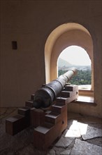 Old cannon in embrasure