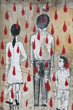 Family in a rain of blood drops
