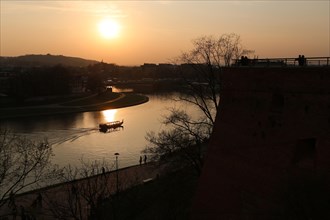 Sunset with boat on the Vistula River
