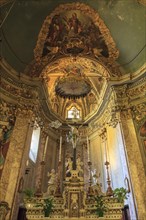 Interior of the Church of San Lorenzo with a wooden crucifix from the 15th century