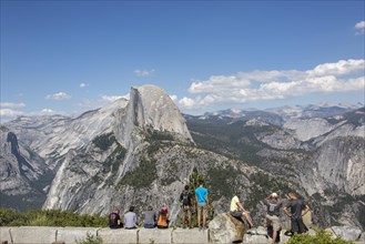 Visitors in front of the Half Dome