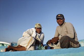 Omani fishermen on a fishing boat