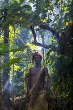 Traditional dressed man in the jungle