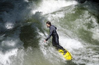 Surfer surfing the Eisbach stream