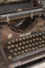 An old rusted Underwood manual typewriter