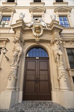 Entrance porch with two Atlas figures from the Liechtenstein City Palace