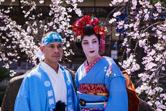 Traditionally dressed mand geisha in the Geisha quarter Gion