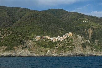 Village with colorful houses by the sea