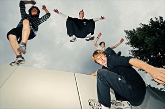A group of freerunners jumping