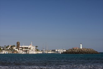 Marina with lighthouse in Caleta de Fuste