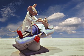 Mice dolls as a dentist and a patient
