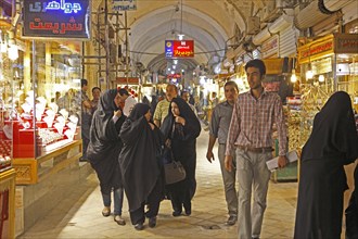 Women in chadors in the bazaar