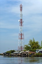 Radio tower in a village on the Tonle Sap lake near Siem Reap